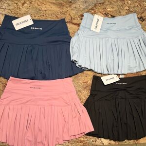 Goldhinge athletic shirts. Navy, light baby blue, black and medium pink